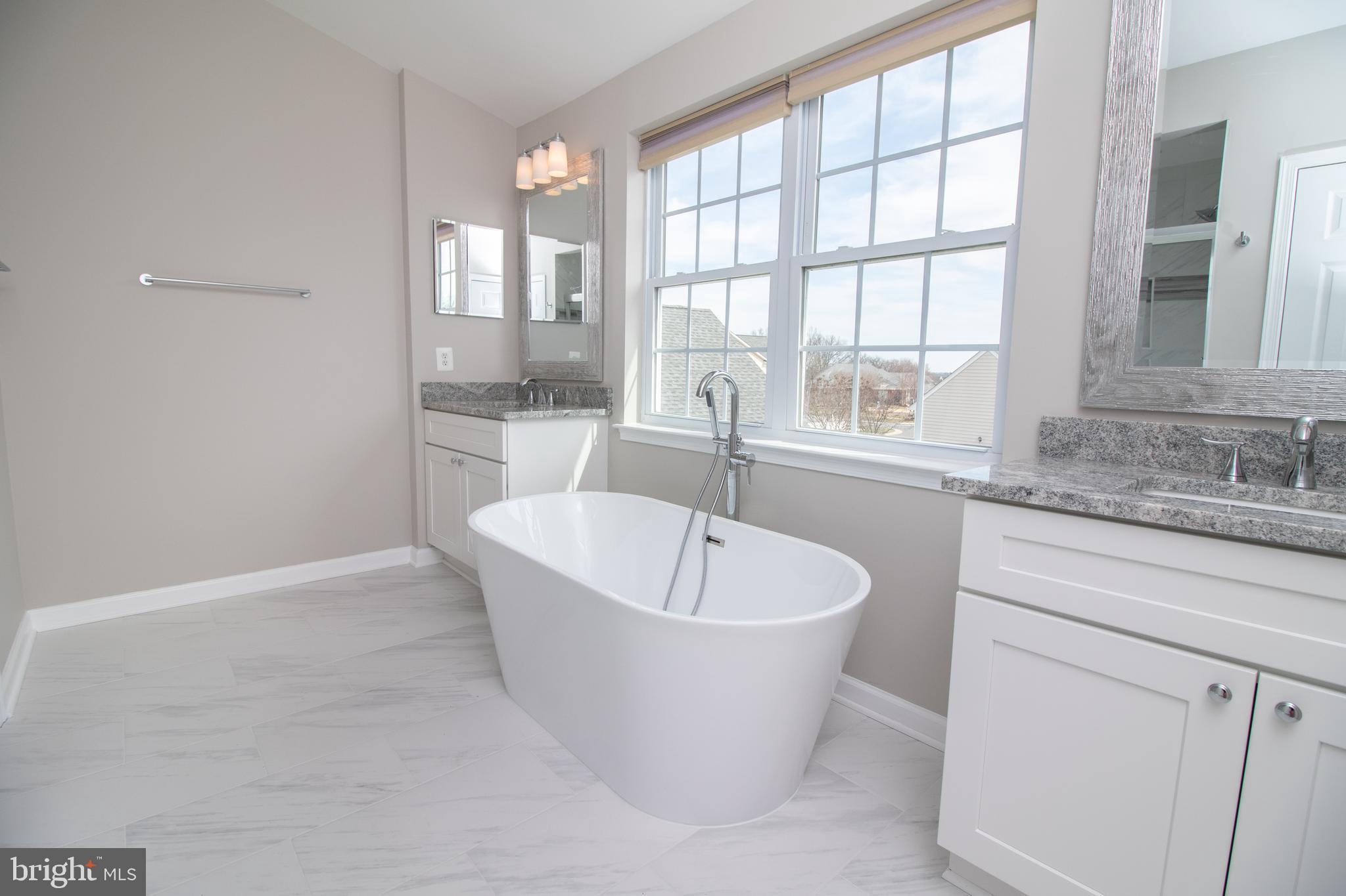 25257 Doolittle Lane Chantilly, VA 20152 - Photo 38 of 52 a white bath tub sitting next to a window