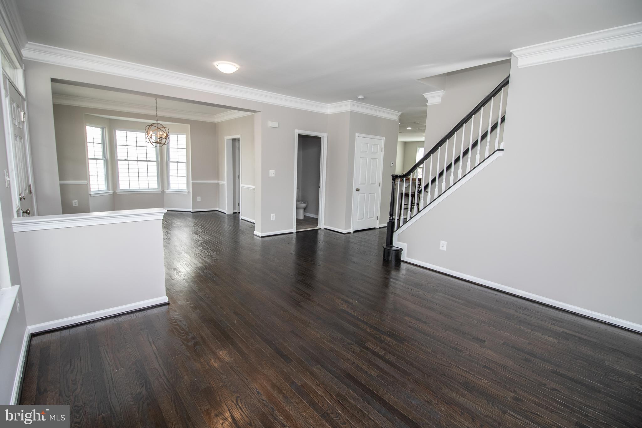 25257 Doolittle Lane Chantilly, VA 20152 - Photo 8 of 52 a view of an entryway with wooden floor