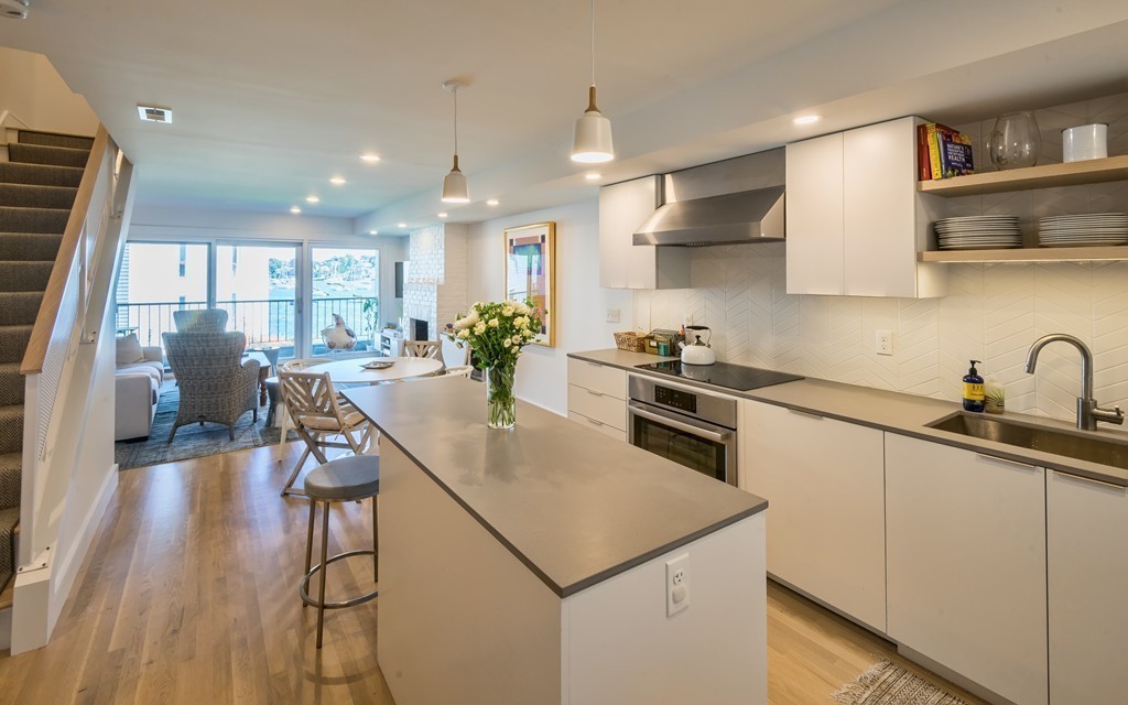 31 Constitution Way, Unit 31 Marblehead, MA 01945 - Photo 12 of 30 a kitchen with a sink a counter space appliances and cabinets