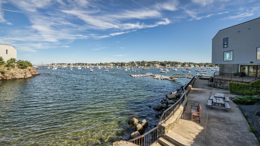 31 Constitution Way, Unit 31 Marblehead, MA 01945 - Photo 21 of 30 a view of a terrace with lawn chairs