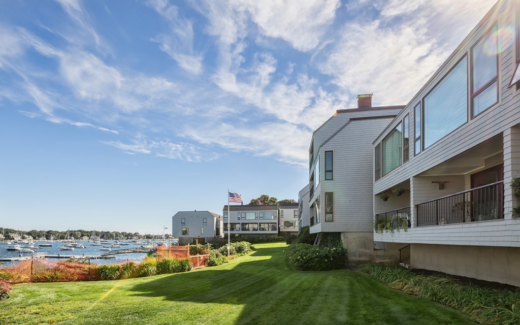 31 Constitution Way, Unit 31 Marblehead, MA 01945 - Photo 22 of 30 a view of a big yard next to a building