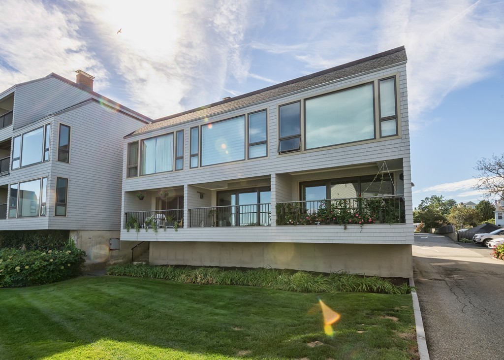 31 Constitution Way, Unit 31 Marblehead, MA 01945 - Photo 3 of 30 a front view of a house with a yard