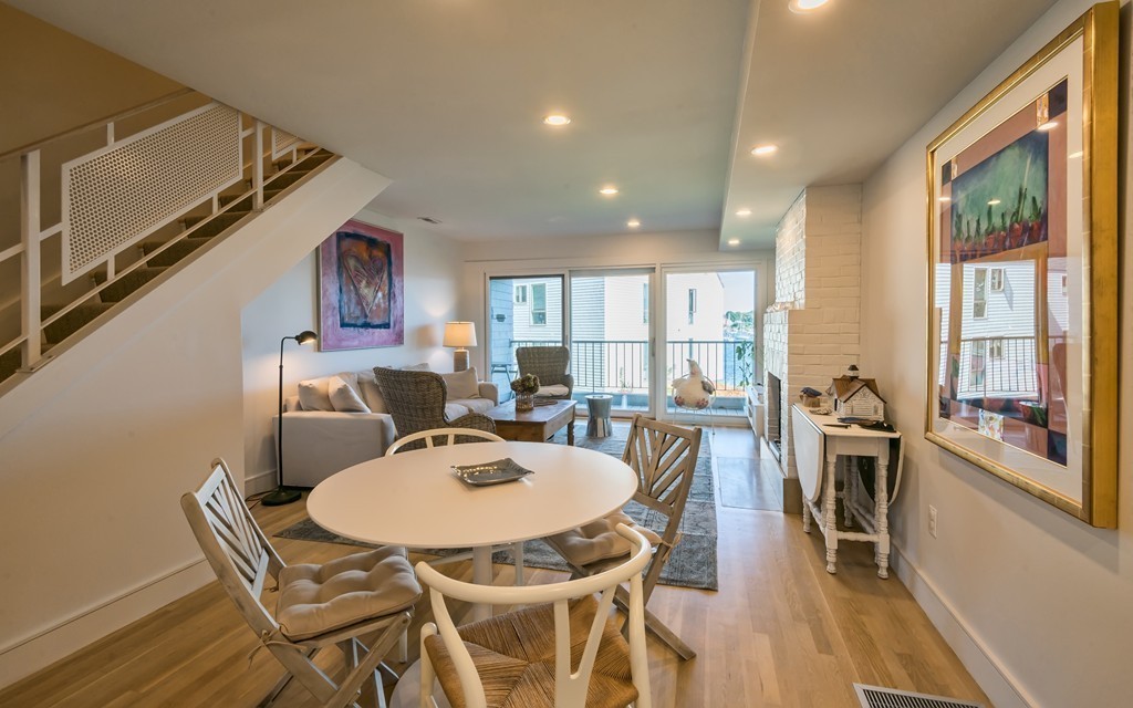 31 Constitution Way, Unit 31 Marblehead, MA 01945 - Photo 8 of 30 a view of a dining room with furniture window and wooden floor