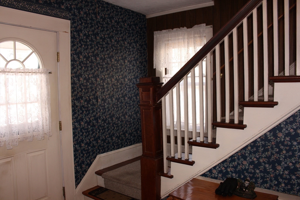 89 Columbus Avenue Greenfield, MA 01301 - Photo 11 of 20 a view of entryway with wooden floor and stairs