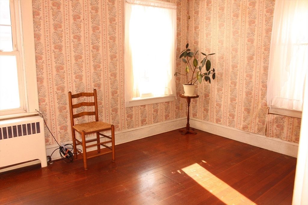 89 Columbus Avenue Greenfield, MA 01301 - Photo 13 of 20 a view of a livingroom with furniture and a window