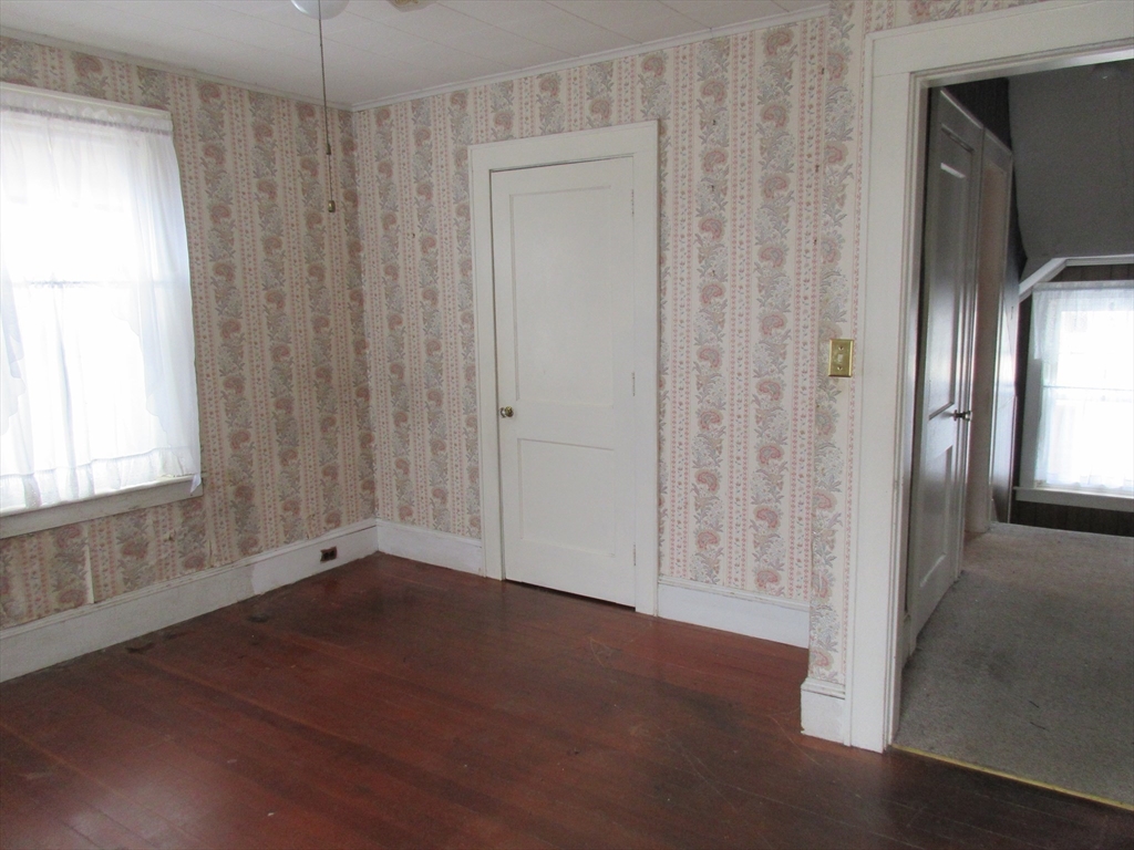 89 Columbus Avenue Greenfield, MA 01301 - Photo 14 of 20 a view of an empty room with a window