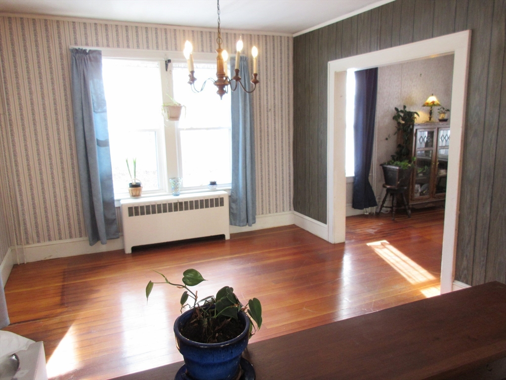 89 Columbus Avenue Greenfield, MA 01301 - Photo 7 of 20 a view of a room with wooden floor and furniture