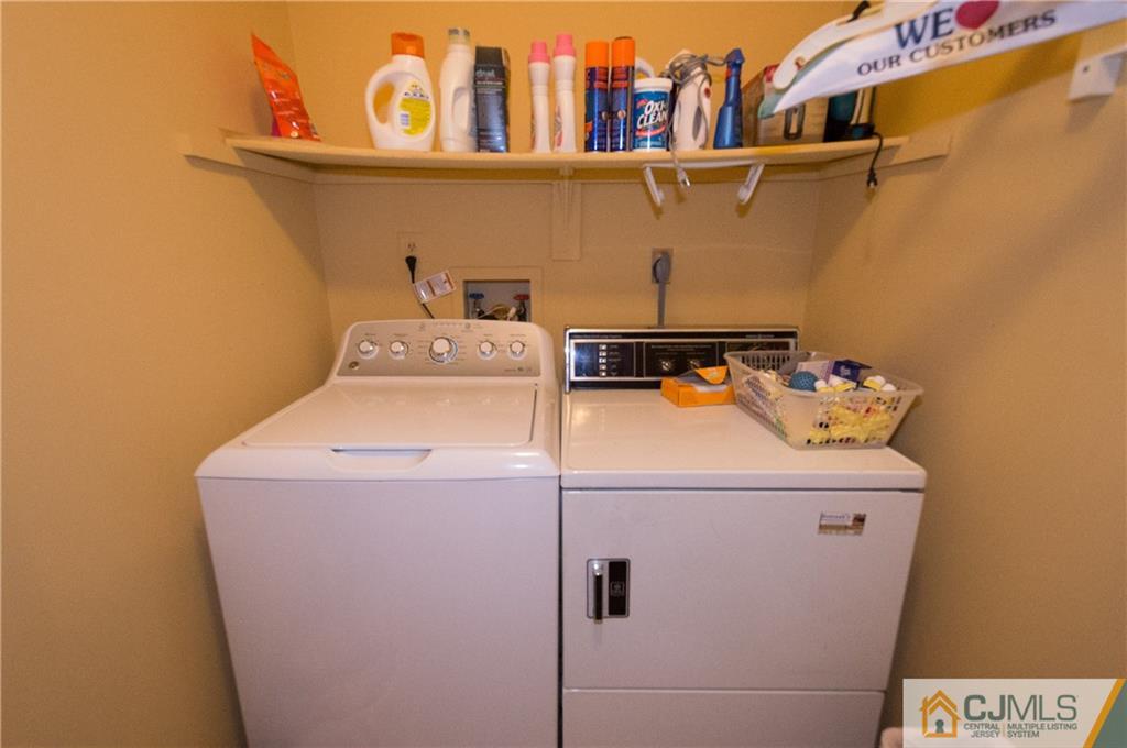 2403 Timber Oaks Road Edison, NJ 08820 - Photo 17 of 25 a utility room with dryer and washer