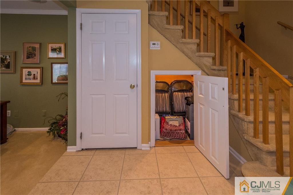 2403 Timber Oaks Road Edison, NJ 08820 - Photo 9 of 25 a view of hallway with stairs and furniture