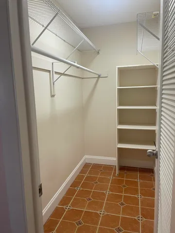 a view of an empty walk in closet