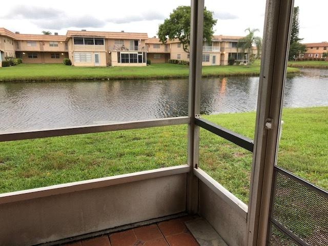 402 Monaco Way, Unit I Delray Beach, FL 33446 - Photo 16 of 25 a view of lake from a window