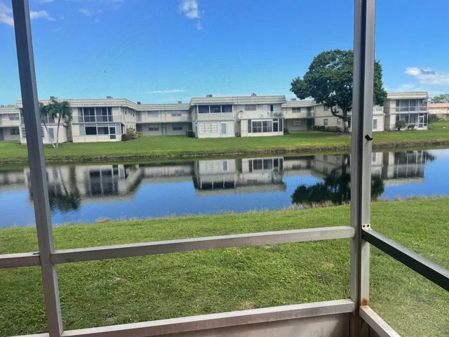 a view of swimming pool from balcony