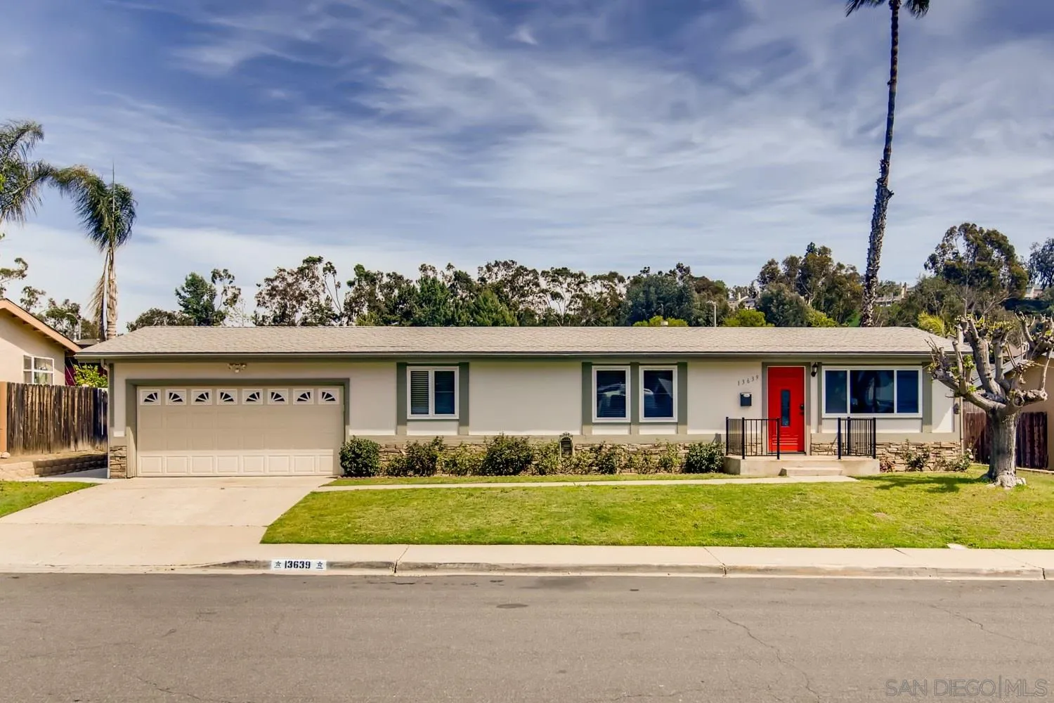13639 Utopia Road Poway, CA 92064 - Photo 1 of 25 a front view of a house with a yard and potted plants