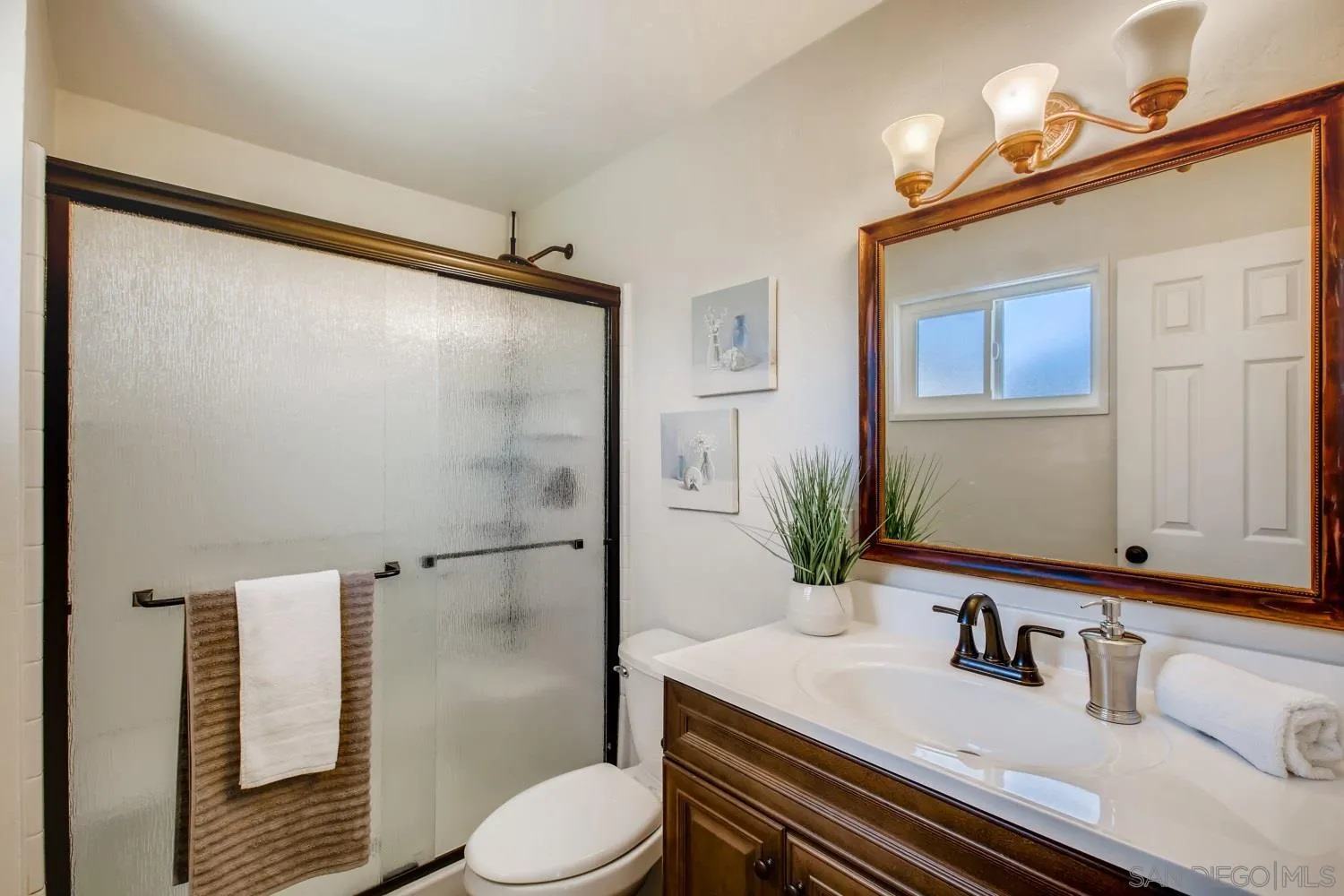 13639 Utopia Road Poway, CA 92064 - Photo 15 of 25 a bathroom with a sink toilet and shower