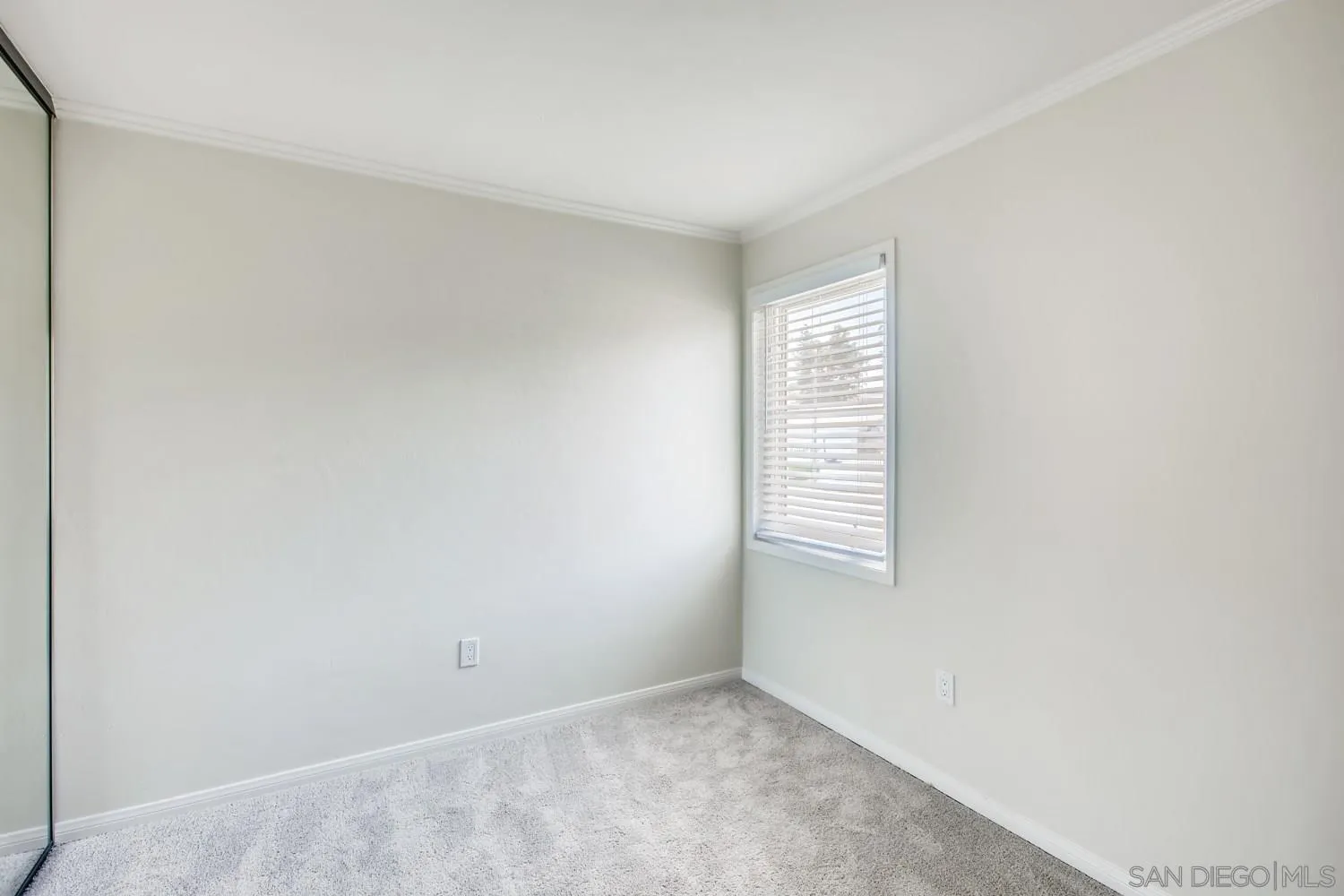 13639 Utopia Road Poway, CA 92064 - Photo 17 of 25 a view of an empty room with a window