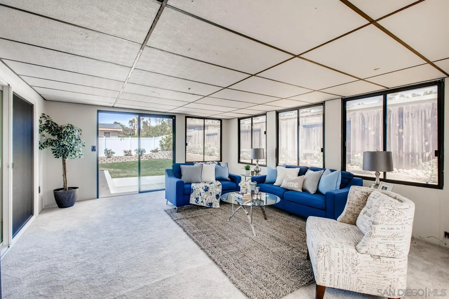 13639 Utopia Road Poway, CA 92064 - Photo 20 of 25 a living room with furniture and large windows