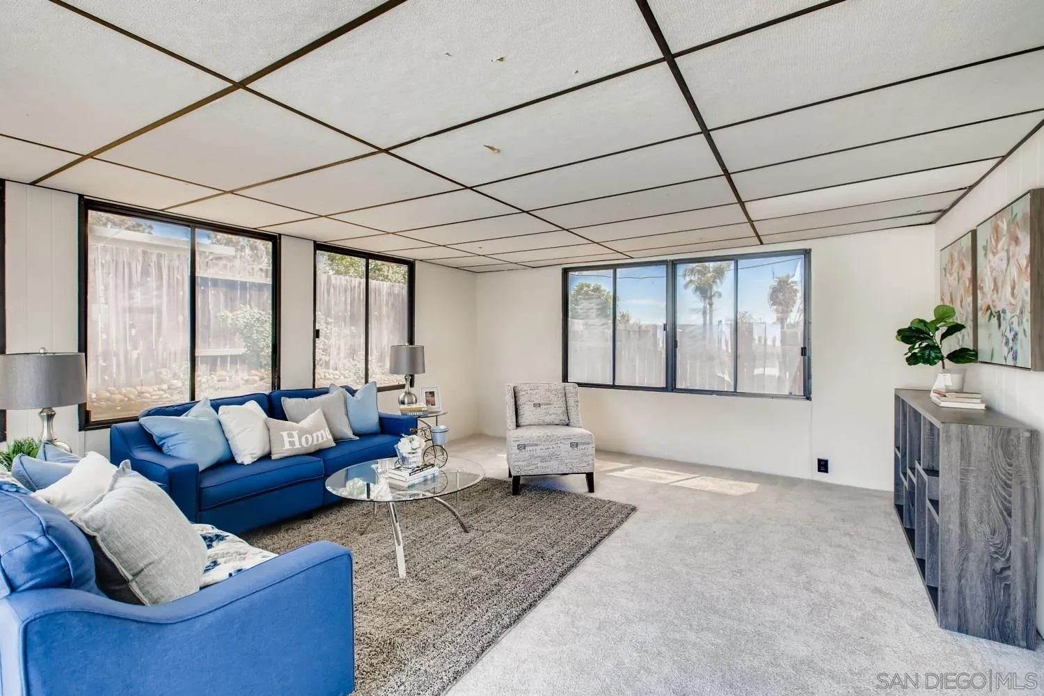 13639 Utopia Road Poway, CA 92064 - Photo 22 of 25 a living room with furniture and large windows