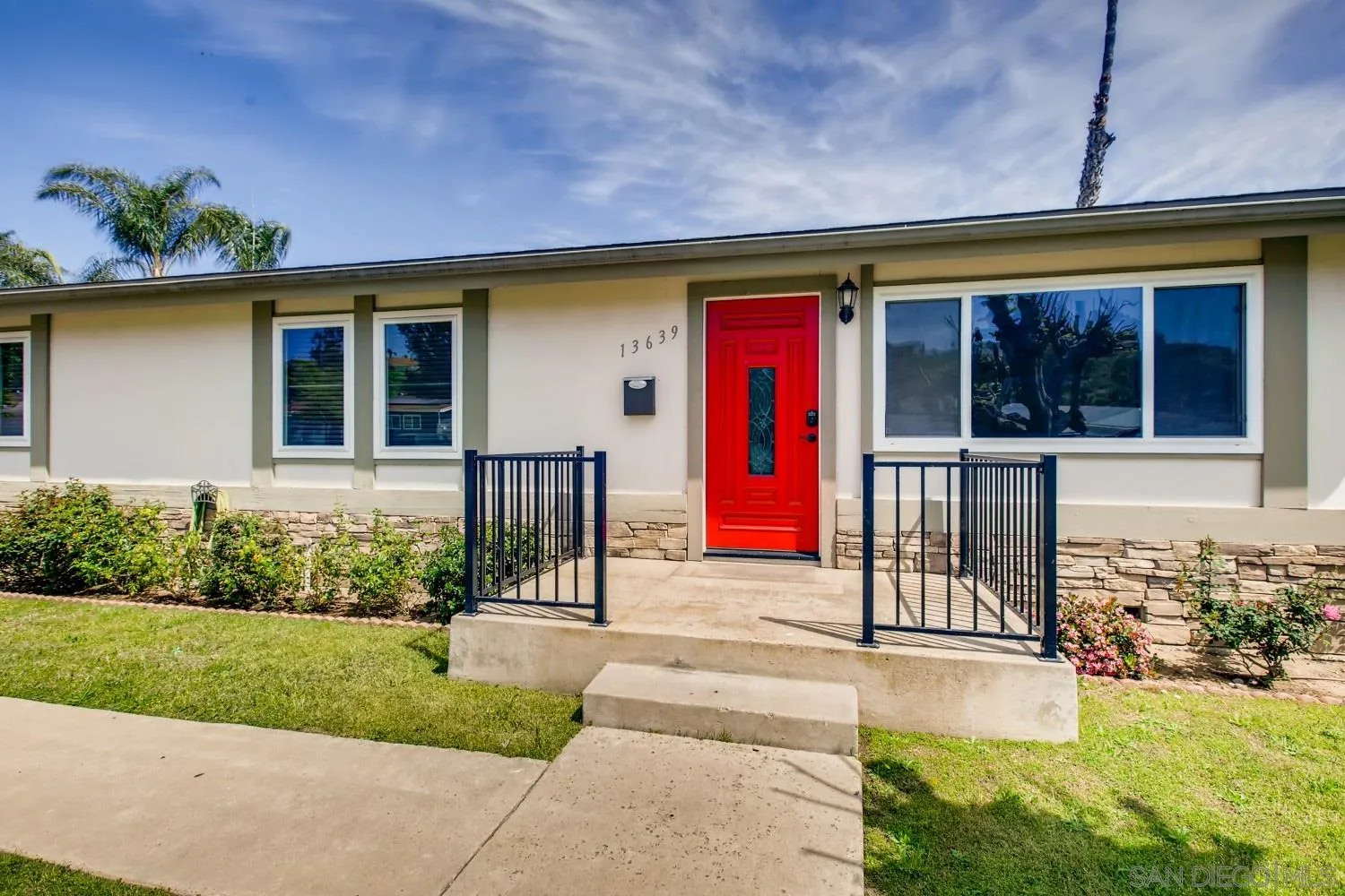 13639 Utopia Road Poway, CA 92064 - Photo 3 of 25 a front view of a house with a yard