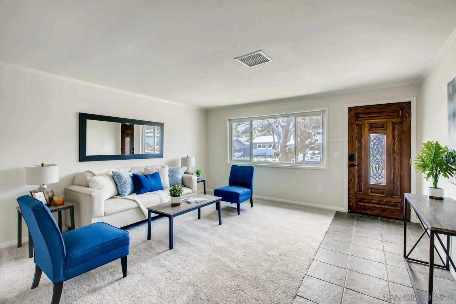 13639 Utopia Road Poway, CA 92064 - Photo 4 of 25 a living room with furniture and a window
