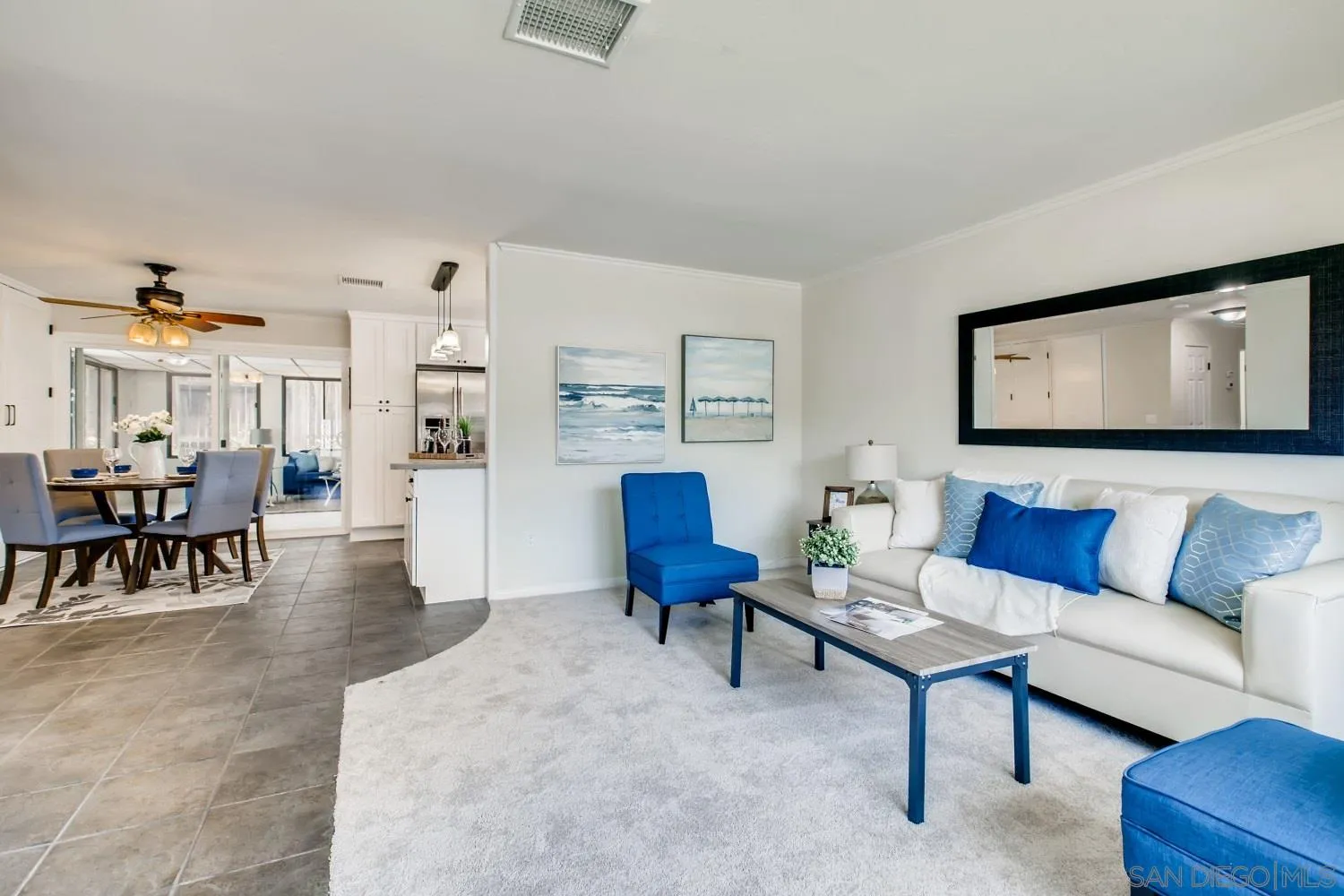 13639 Utopia Road Poway, CA 92064 - Photo 6 of 25 a living room with furniture and a dining table with rug