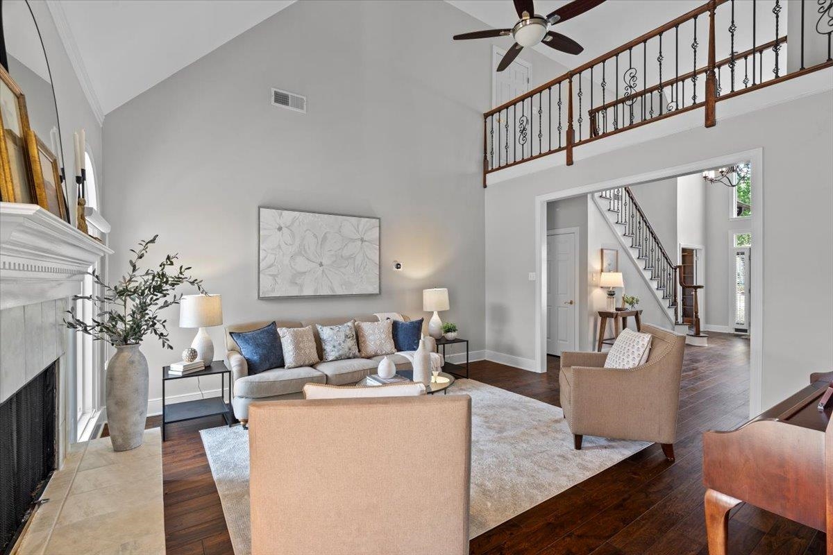 10440 Ansley Cove Collierville, TN 38017 - Photo 11 of 40 a living room with furniture and a chandelier