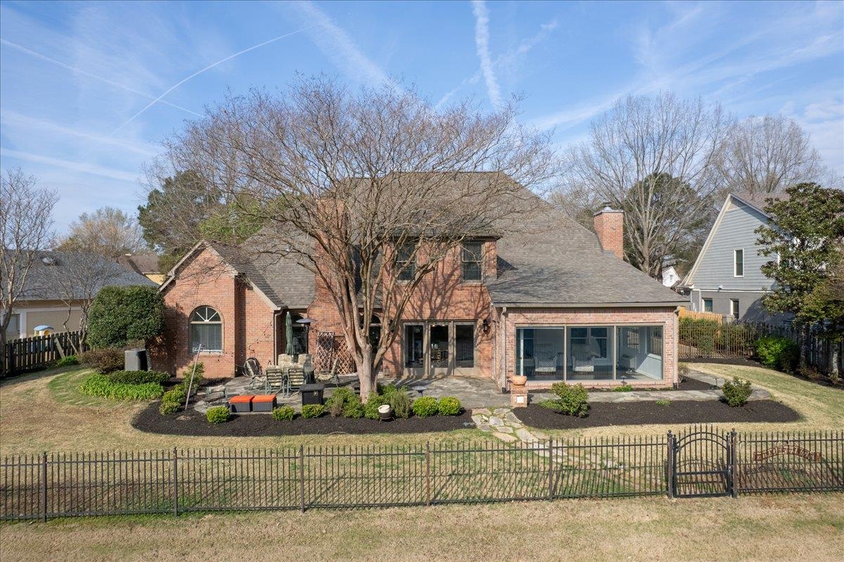 10440 Ansley Cove Collierville, TN 38017 - Photo 39 of 40 a front view of a house with garden