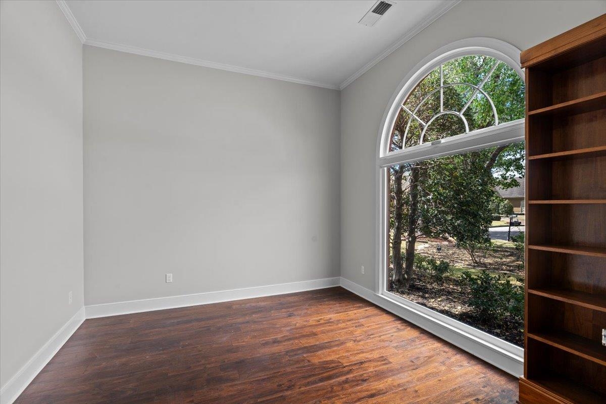 10440 Ansley Cove Collierville, TN 38017 - Photo 7 of 40 an empty room with wooden floor and windows
