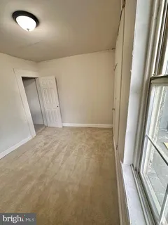 a bathroom with a toilet a sink and bathtub