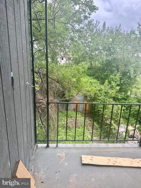 113 North Fulton Avenue Baltimore, MD 21223 - Photo 14 of 26 a view of a fence and trees