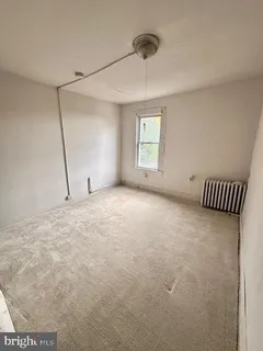 a view of a room with a lot of wooden walls