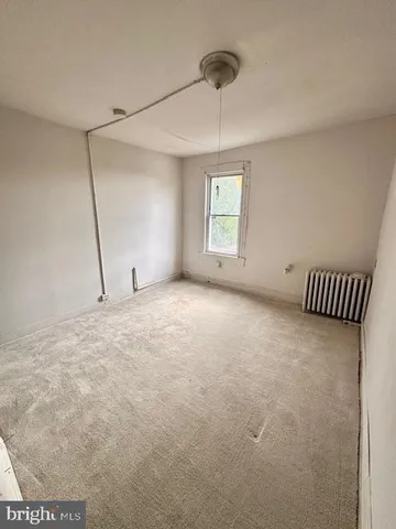 a view of a room with a lot of wooden walls