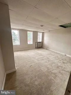 an empty room with windows