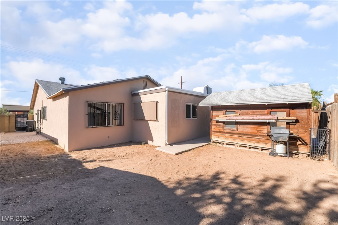 2246 East Russell Road Las Vegas, NV 89119 - Photo 22 of 24 Back of property with stucco siding