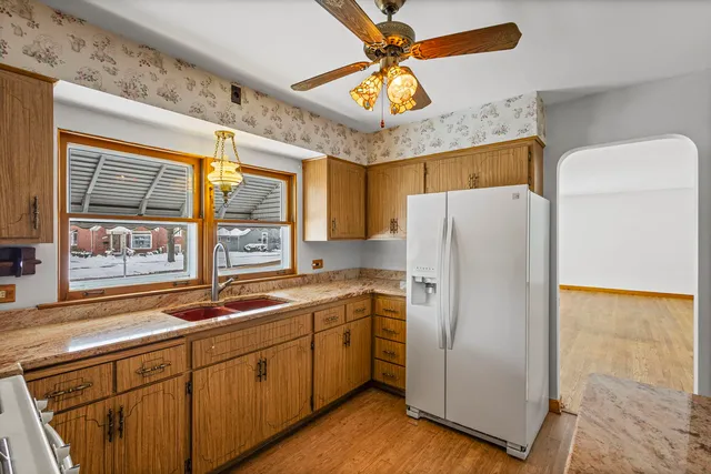 a kitchen with a stove and a sink