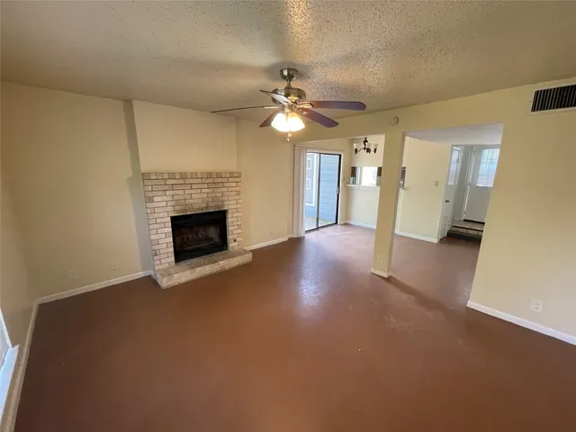 a view of a livingroom with a kitchen