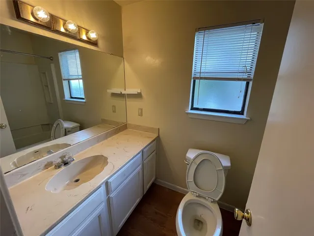 a bathroom with a tub and a shower