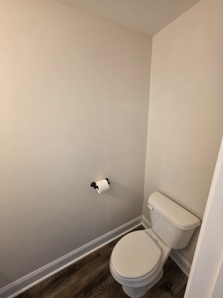 550 Peachers Mill Road, Unit A2 Clarksville, TN 37042 - Photo 7 of 15 a white toilet sitting next to a shower