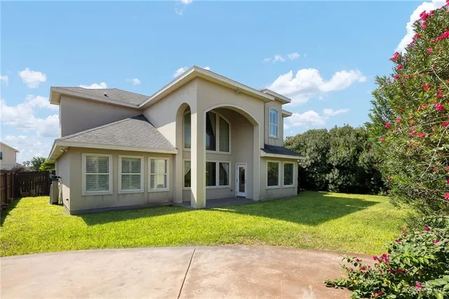 a view of a house with a garden