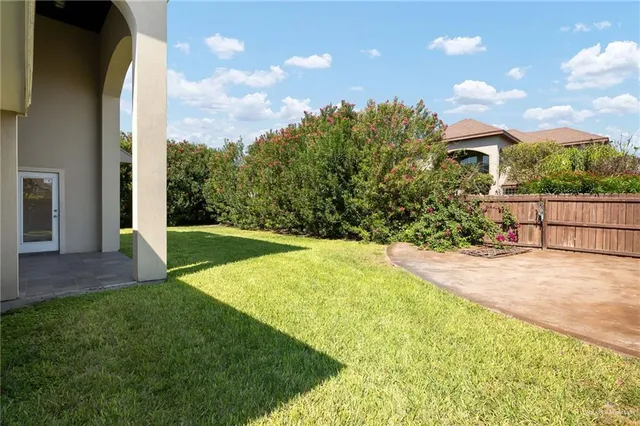 a view of a backyard with garden