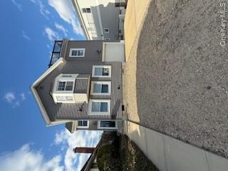 733 East Walnut Street, Unit UPPR Long Beach, NY 11561 - Photo 26 of 26 a view of a house with a yard