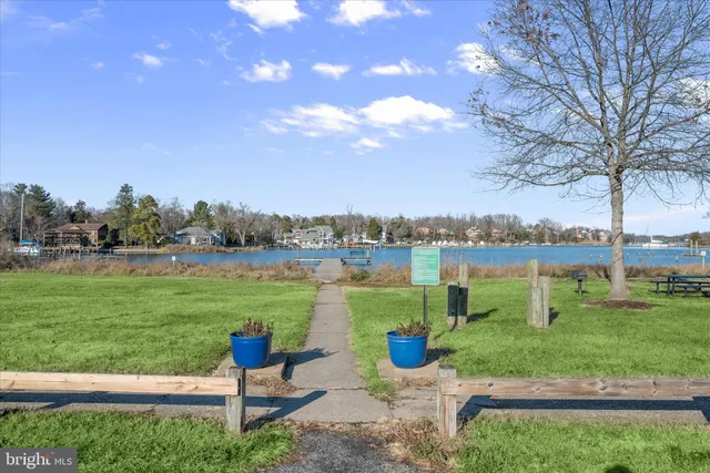 a view of a garden with houses