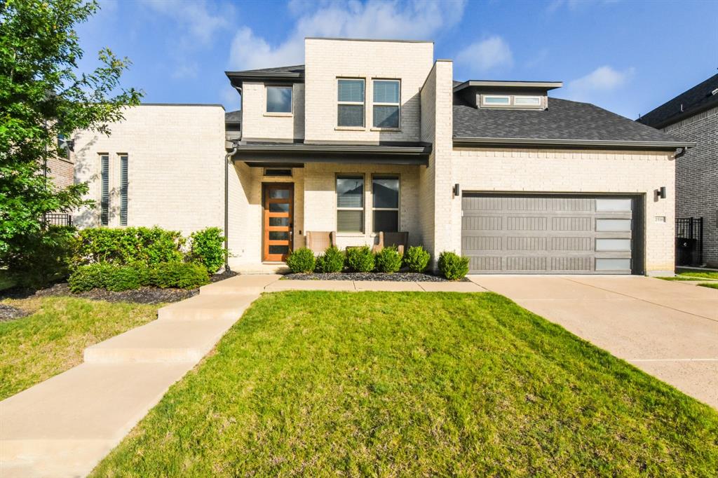 2516 Maidenhair Road Frisco, TX 75033 - Photo 2 of 30 a front view of a house with a yard and garage