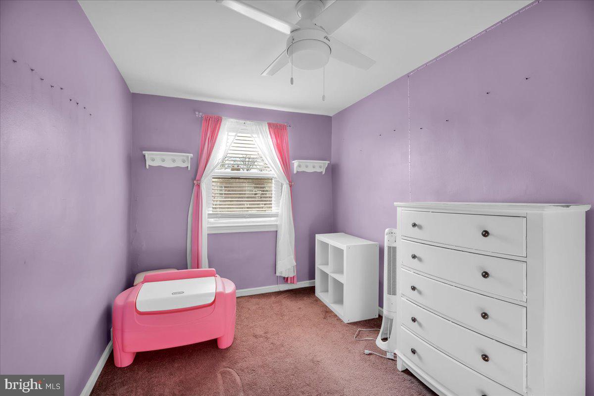 8504 Forrest Avenue Philadelphia, PA 19150 - Photo 17 of 23 a bedroom with a bed and a dresser in it