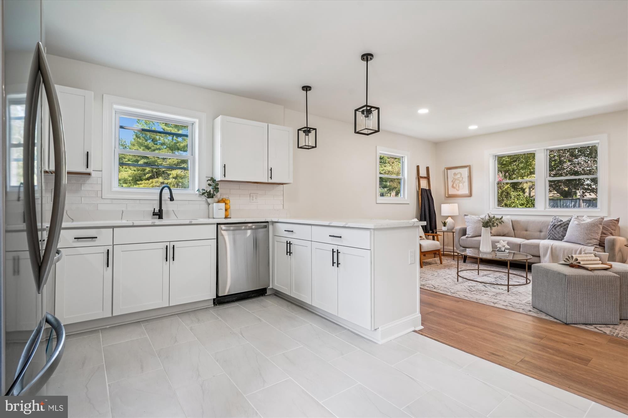 1030 Stephen Reid Drive Huntingtown, MD 20639 - Photo 12 of 30 a living room with furniture a window and appliances