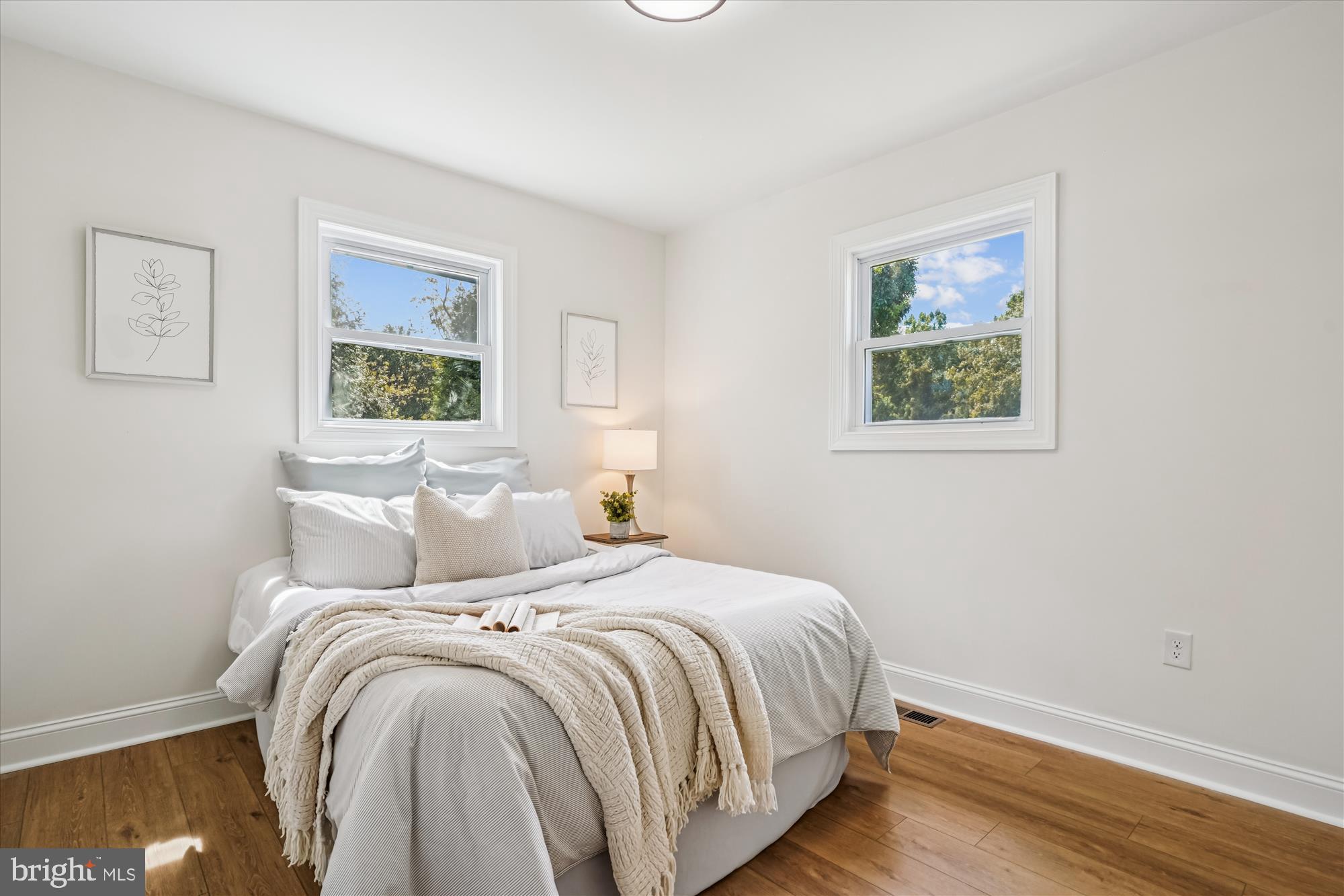 1030 Stephen Reid Drive Huntingtown, MD 20639 - Photo 14 of 30 a bedroom with a bed and a painting on the wall