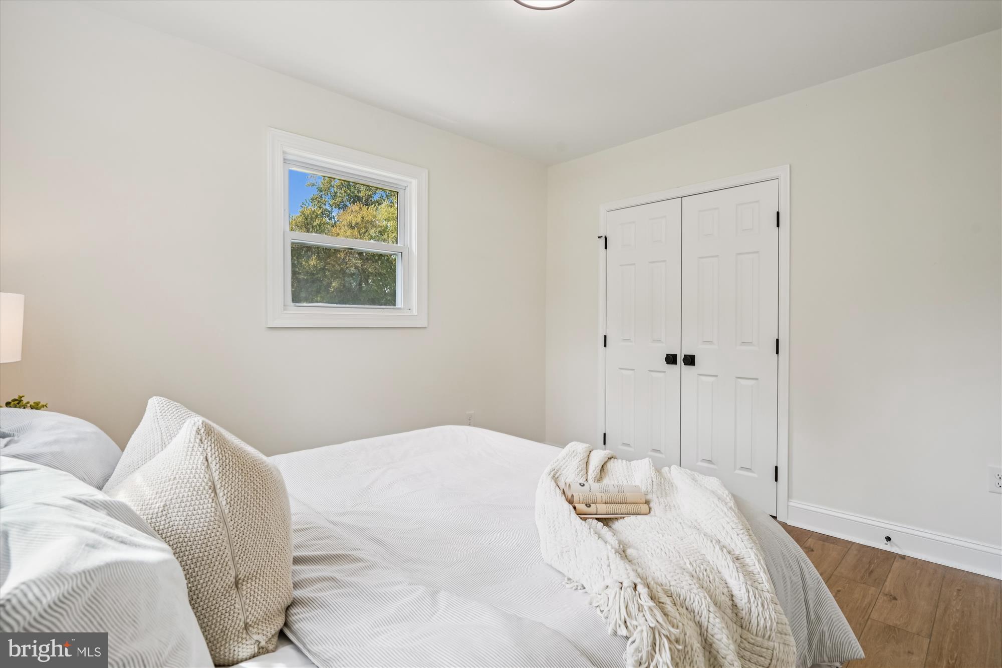 1030 Stephen Reid Drive Huntingtown, MD 20639 - Photo 15 of 30 a bedroom with a bed and a painting on the wall