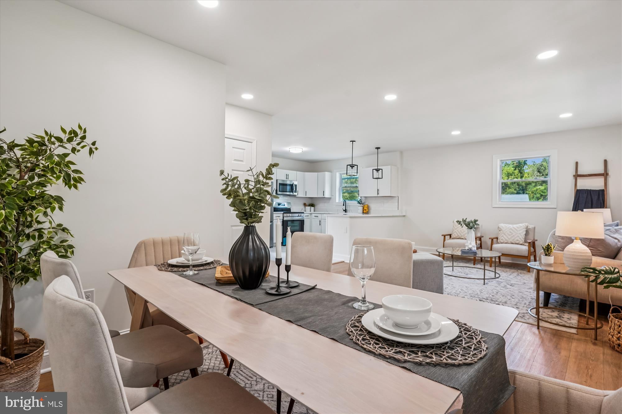 1030 Stephen Reid Drive Huntingtown, MD 20639 - Photo 7 of 30 a living room with furniture potted plant and a mirror