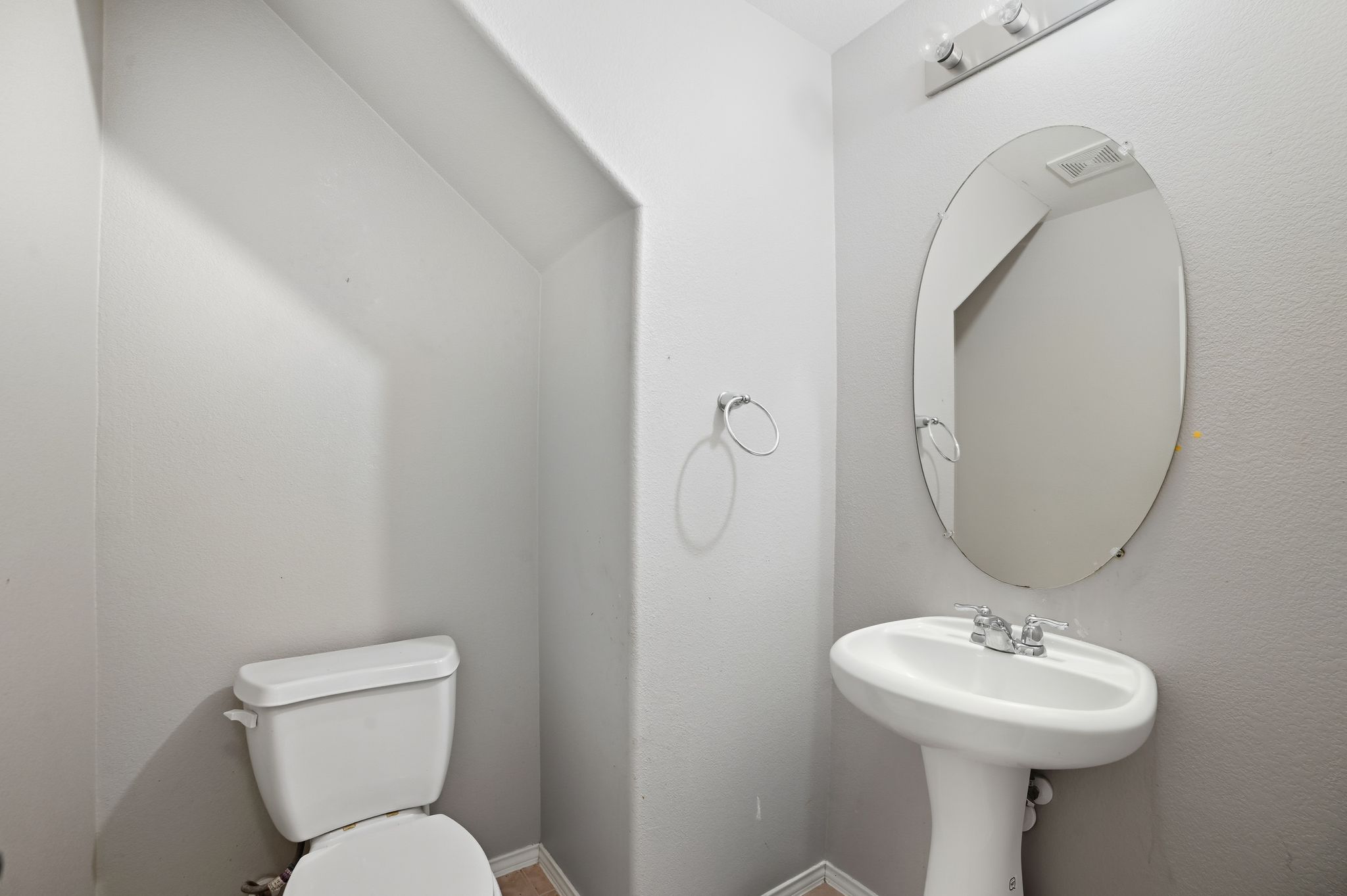 316 Housefinch Loop Leander, TX 78641 - Photo 16 of 37 Convenient downstairs powder bath for guests.