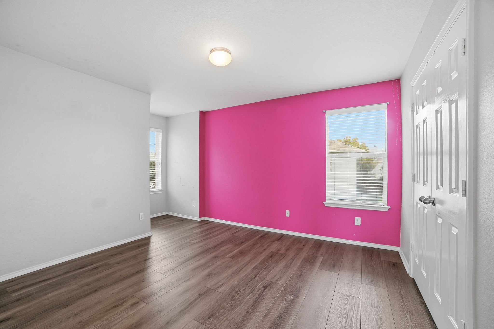 316 Housefinch Loop Leander, TX 78641 - Photo 24 of 37 a view of a livingroom with wooden floor and a window