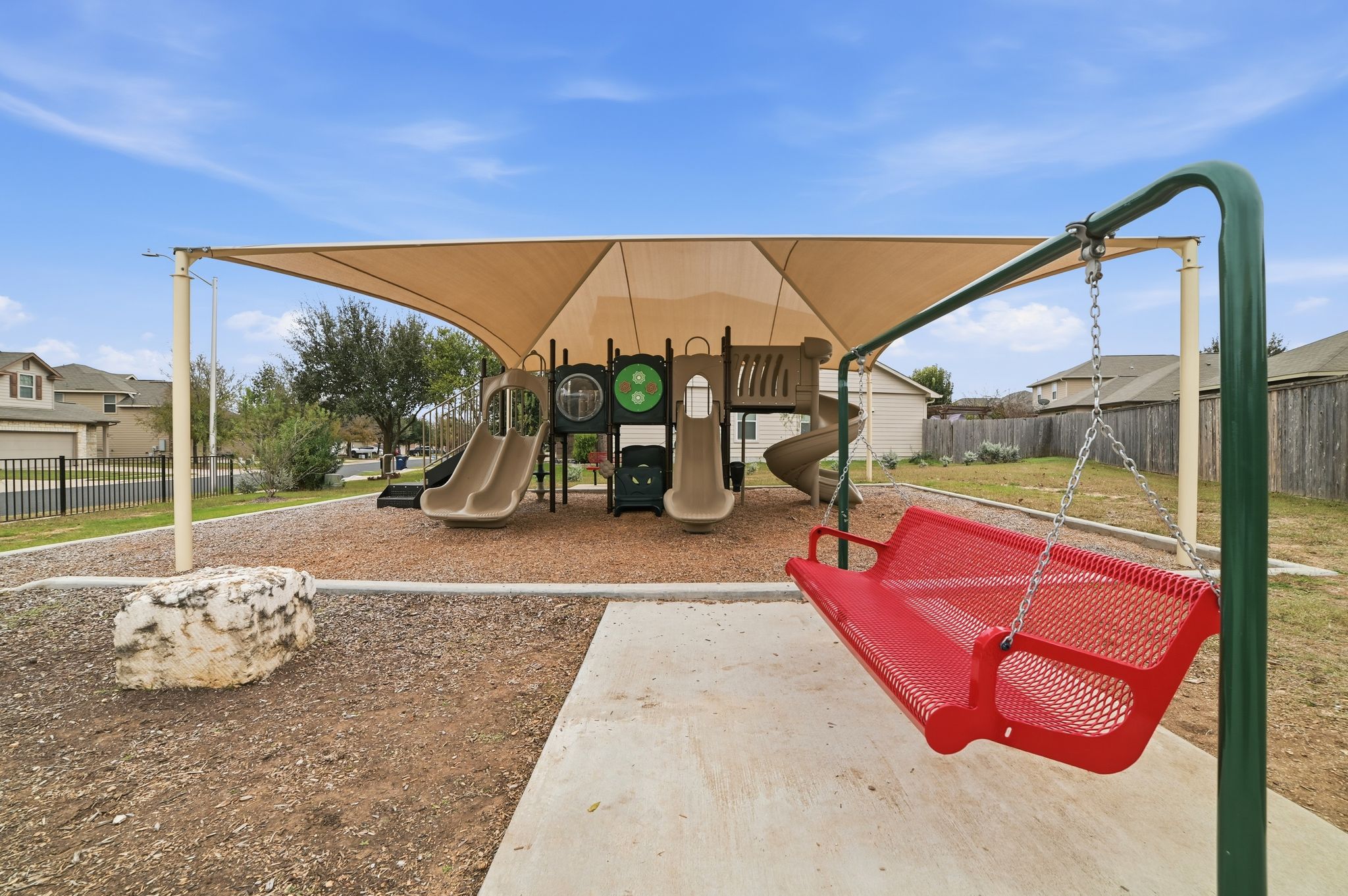 316 Housefinch Loop Leander, TX 78641 - Photo 35 of 37 Neighborhood playground with shaded seating.